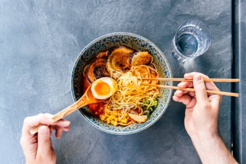 man eating tonkotsu ramen, personal perspective directly above view - food stock pictures, royalty-free photos & images