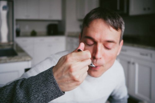 man enjoys meal at home - food stock pictures, royalty-free photos & images