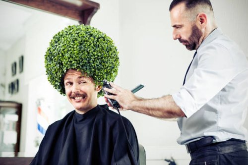 man in a barber shop - hairstyle stockfoto's en -beelden
