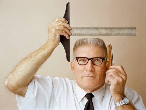 man measuring his flat top for precision - hairstyle stock pictures, royalty-free photos & images