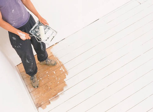 man painted into corner - home decoration stockfoto's en -beelden