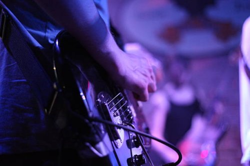 man playing guitar - concert stock pictures, royalty-free photos & images
