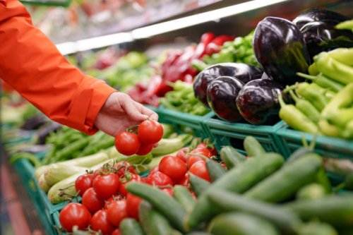 man shopping vegetables in groceries store - food stock pictures, royalty-free photos & images