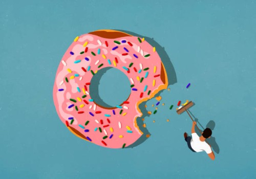man with broom sweeping up donut sprinkles - junk food stock illustrations