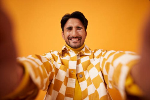 man with vitiligo standing with eyes closed - fashion stock pictures, royalty-free photos & images