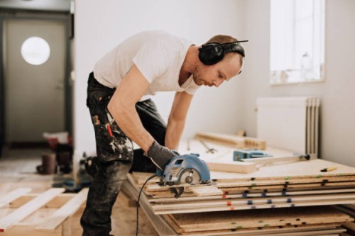 man working and renovating a house - home decoration stock pictures, royalty-free photos & images