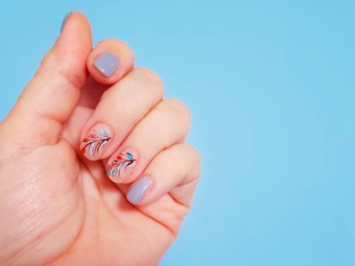 manicured hand with a leaf design at nail polish - nails art stock pictures, royalty-free photos & images