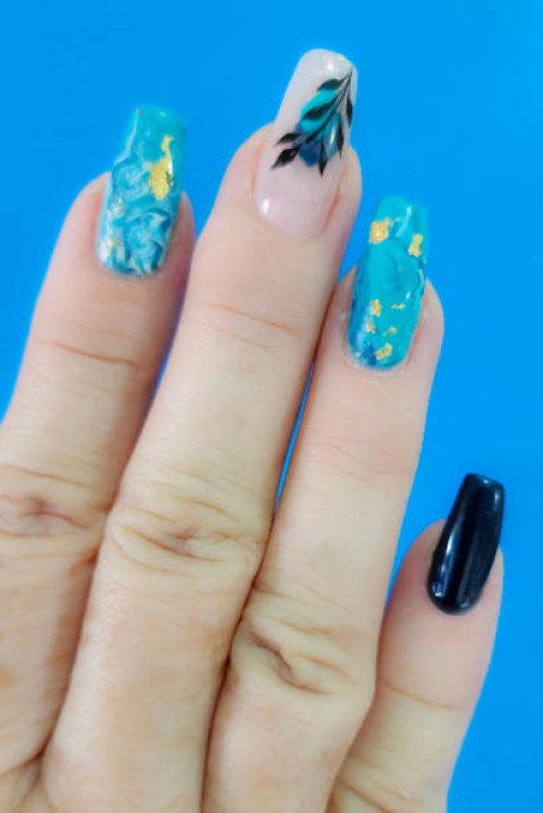marbled nail art on long nails - nails art stock pictures, royalty-free photos & images