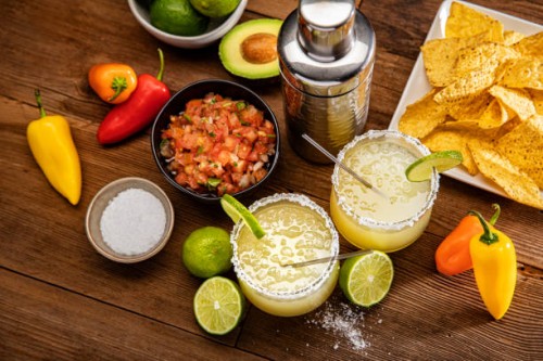 margarita glasses on a retro wood background - food stock pictures, royalty-free photos & images