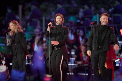 Mark Owen, Howard Donald and Gary Barlow of Take That perform during the Coronation Concert on May 7, 2023 in Windsor, England. The Windsor Castle...