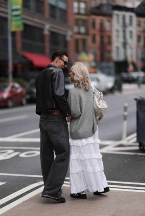 Marlon Bosse Titus Preis seen wearing brown sunglasses, silver small hoop earring, black cotton t-shirt, black leather bomber jacket, Diesel grey...