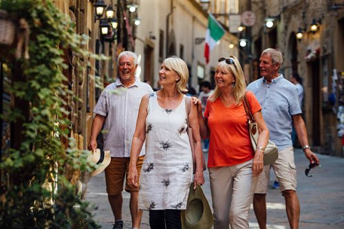 mature couples looking around old town italy - travel stock pictures, royalty-free photos & images