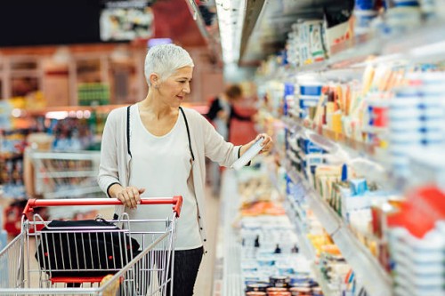 mature woman groceries shopping. - food stock pictures, royalty-free photos & images