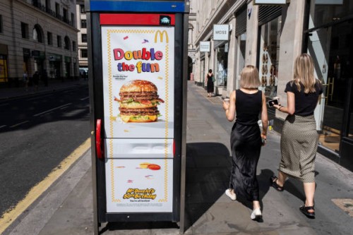 McDonalds Double Big Mac with Bacon beef burger advertising poster with the tagline 'double the fun' on 29th July 2024 in London, United Kingdom....
