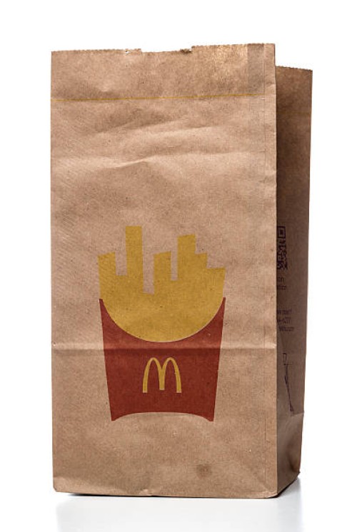 mcdonalds food take out paper bag - junk food stock pictures, royalty-free photos & images