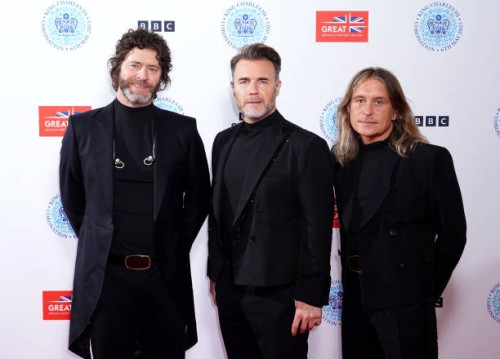 Members of Take That Howard Donald, Gary Barlow and Mark Owen backstage at the Coronation Concert held in the grounds of Windsor Castle on May 7,...