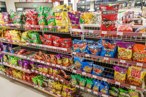 Merida, Mexico, Centro, Oxxo convenience store, Cheetos Doritos snacks chips junk food bags.