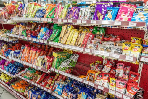 Merida, Mexico, Zona Paseo Montejo Centro, Oxxo convenience store, junk food candies cookies.