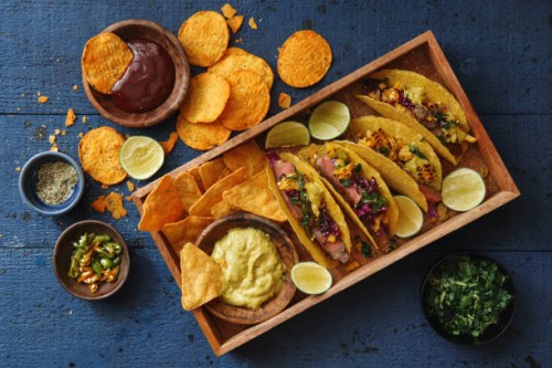mexican crunchy taco shells with beef and vegetables - junk food stock pictures, royalty-free photos & images