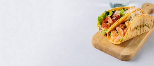 mexican food. tortilla tacos with traditional homemade salsa salad, avocado and grilled shrimp on wooden board on light background. - junk food stock pictures, royalty-free photos & images