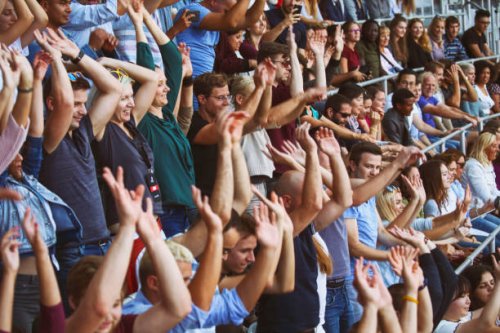 mexican wave on stadium - concert stock pictures, royalty-free photos & images