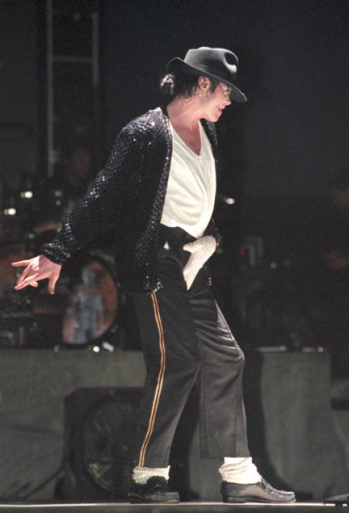 Michael Jackson performs on stage on his HIStory tour in December 1996.