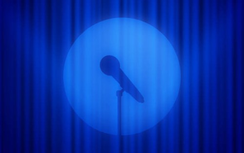 microphone stage performance stand up comedy spotlight background - concert stock illustrations