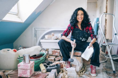 mid adult woman making home renovation - home decoration stock pictures, royalty-free photos & images