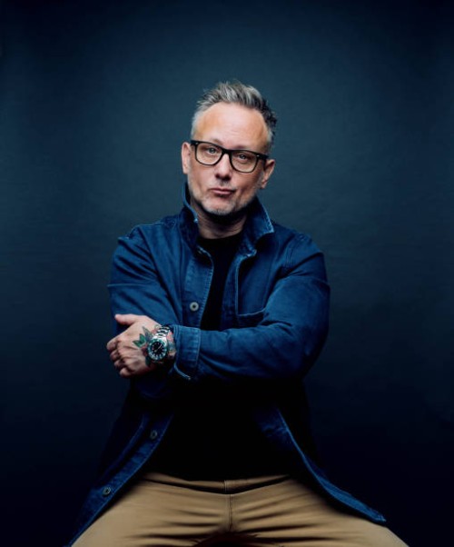 middle-aged hipster wearing blue jacket - fashion stock pictures, royalty-free photos & images