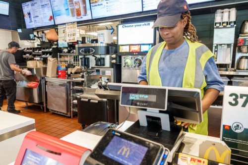 Mims, Florida, McDonald's Fast food restaurant inside cashier and checkout counter.