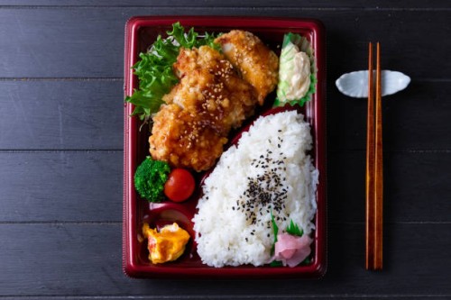 miyazaki style nanban chicken rice bento - junk food stock pictures, royalty-free photos & images