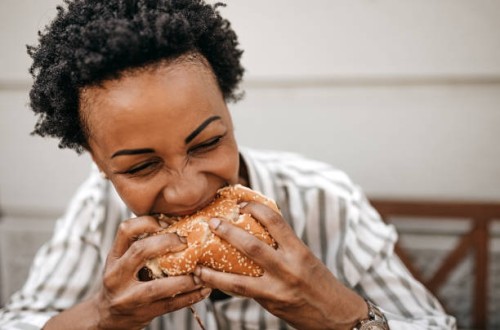 mmm, that was amazing - junk food stock pictures, royalty-free photos & images