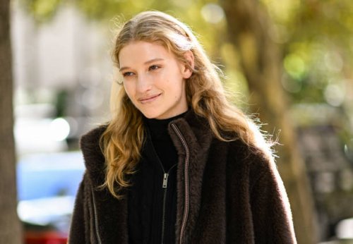 Model Apolline Rocco Fohrer is seen wearing a black jacket, black sweater outside the Miu Miu show during Womenswear Spring/Summer 2025 as part of...