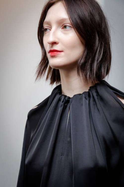 Model backstage ahead of the Eudon Choi show during London Fashion Week February 2023 on February 18, 2023 in London, England.