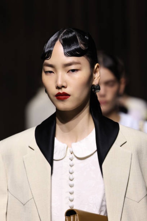 Model, beauty detail, walks the runway at the Jil Sander fashion show during the Milan Womenswear Spring/Summer 2025 on September 18, 2024 in Milan,...