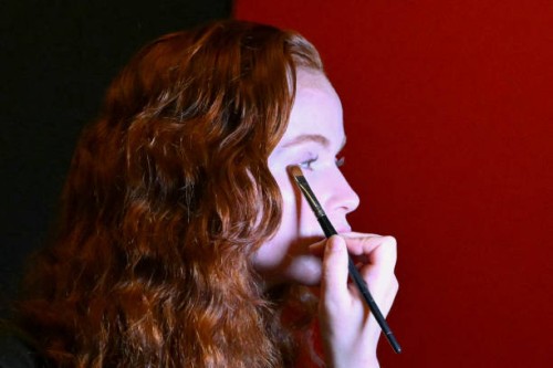 Model gets made-up in backstage prior to the Max Mara collection show as part of the Milan Fashion Week Womenswear Autumn/Winter 2025/2026 in Milan...