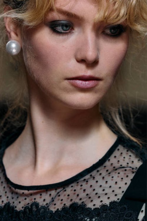 Model gets ready backstage ahead of the Bora Aksu Spring/Summer 2025 collection, at London Fashion Week in London, on September 13, 2024.