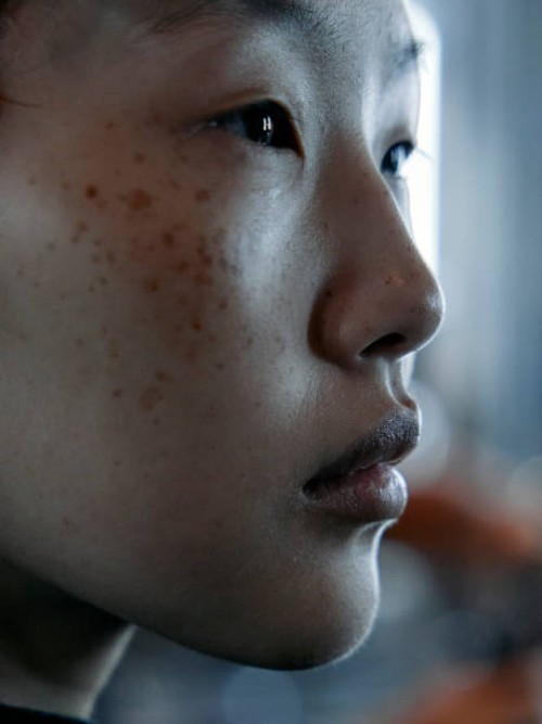 Model gets ready backstage ahead of the Richard Quinn Spring/Summer 2025 collection at London Fashion Week in London on September 14, 2024.