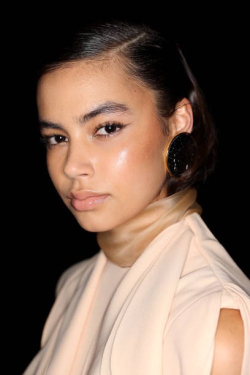 Model poses backstage ahead of the Carla Zampatti Presented by Porsche show during Australian Fashion Week Presented By Pandora 2024 at Carriageworks...