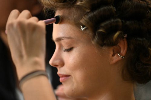 Model prepares backstage ahead of the all is a gentle spring show during Australian Fashion Week Presented By Pandora 2024 at Carriageworks on May...