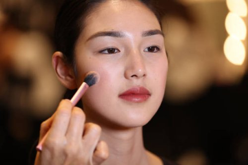 Model prepares backstage ahead of the Rory William Docherty show during Australian Fashion Week Presented By Pandora 2024 at Carriageworks on May 13,...