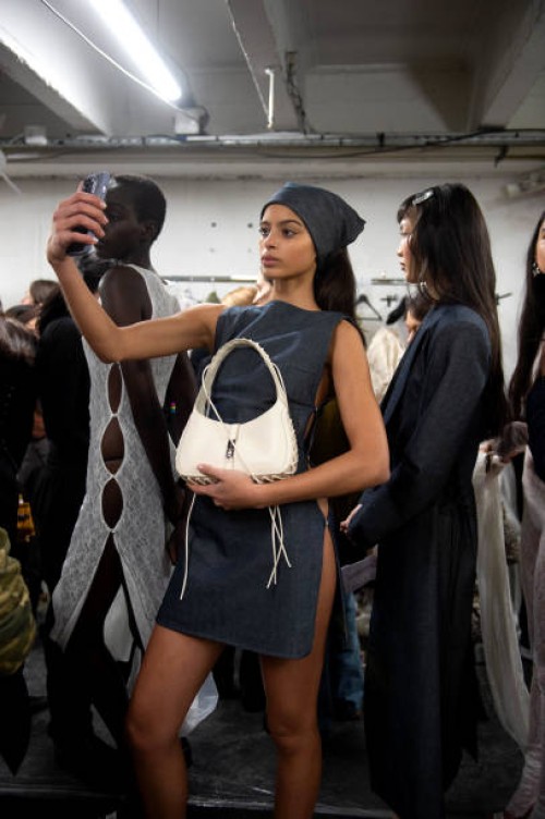 Model takes a selfie backstage prior to the Marcia Womenswear Fall Winter 2023-2024 show as part of Paris Fashion Week on March 01, 2023 in Paris,...