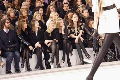 Model walks on the catwalk next to Sean Lennon, Karine Roitfeld, Sofia Coppola, Diane Kruger , Kate Bosworth and Rinko Kikuchi at the Chanel Fashion...