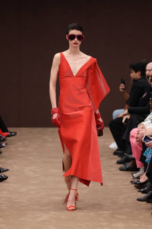 Model walks the runway at the Ferrari fashion show during the Milan Womenswear Spring/Summer 2025 on September 21, 2024 in Milan, Italy.