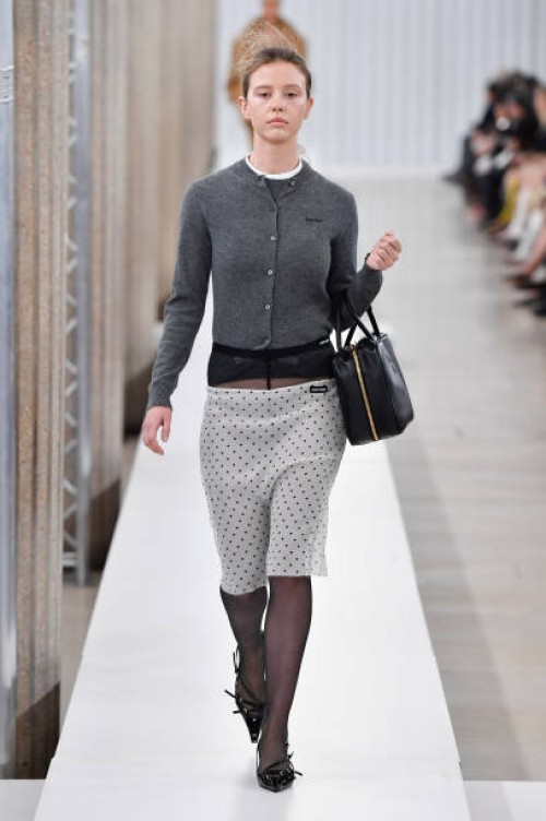 Model walks the runway during the Miu Miu Ready to Wear Fall/Winter 2023-2024 fashion show as part of the Paris Fashion Week on March 7, 2023 in...
