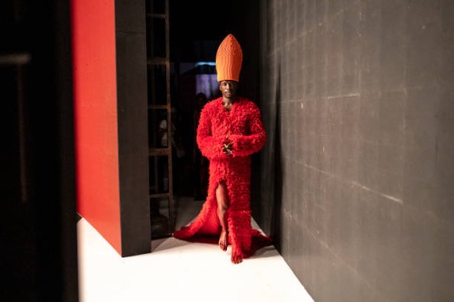 Model wearing a creation by Nigerian designer Oshobor enters the catwalk during the Lagos Fashion Week on October 24, 2024.