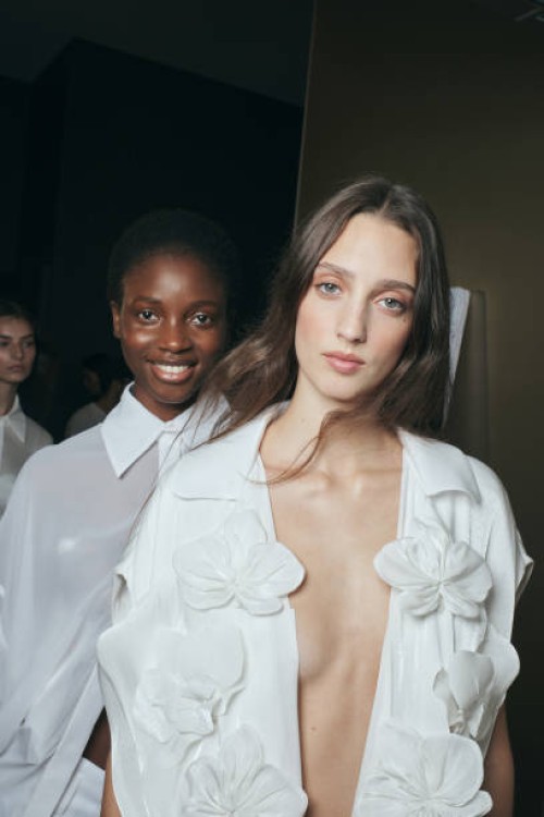 Models are seen backstage ahead of the Genny fashion show during the Milan Fashion Week Womenswear Spring/Summer 2024 on September 21, 2023 in Milan,...