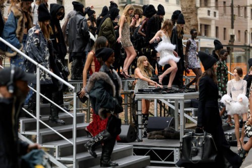 Models dance on the runway and Victoria De Angelis performs as DJ at the Dolce & Gabbana fashion show during the Milan Fashion Week - Womenswear...