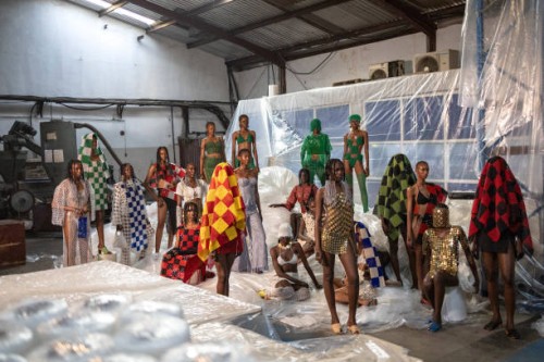 Models pose for a group photo during private fashion show to launch the SS25 collection by Nigerian designer Bubu Ogisi at Iamisigo brand during...