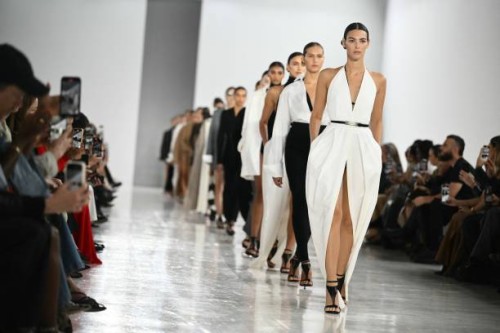 Models walk the runway during the Max Mara collection show at Milan's Fashion Week Womenswear Spring / Summer 2025, on September 19, 2024 in Milan.